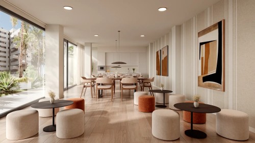 Interior del salón social o club social de la promoción Insur Elyonia, un espacio acogedor diseñado para reuniones vecinales y eventos privados con estética contemporánea.